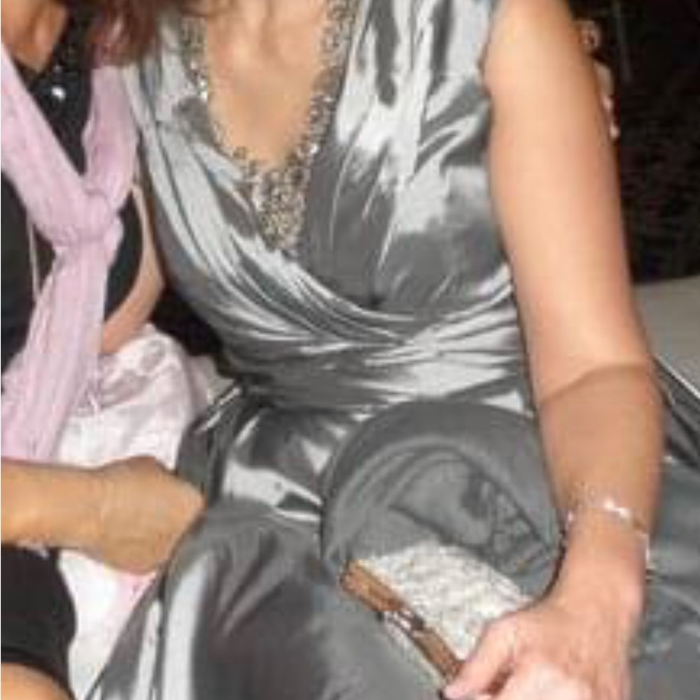 Custom made silver dress. Worn once for a wedding.